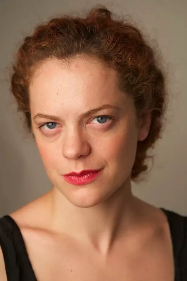 Headshot of Laura Careless wearing a black top