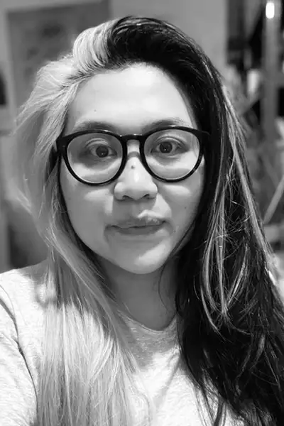 Black and white headshot of Jean Chan