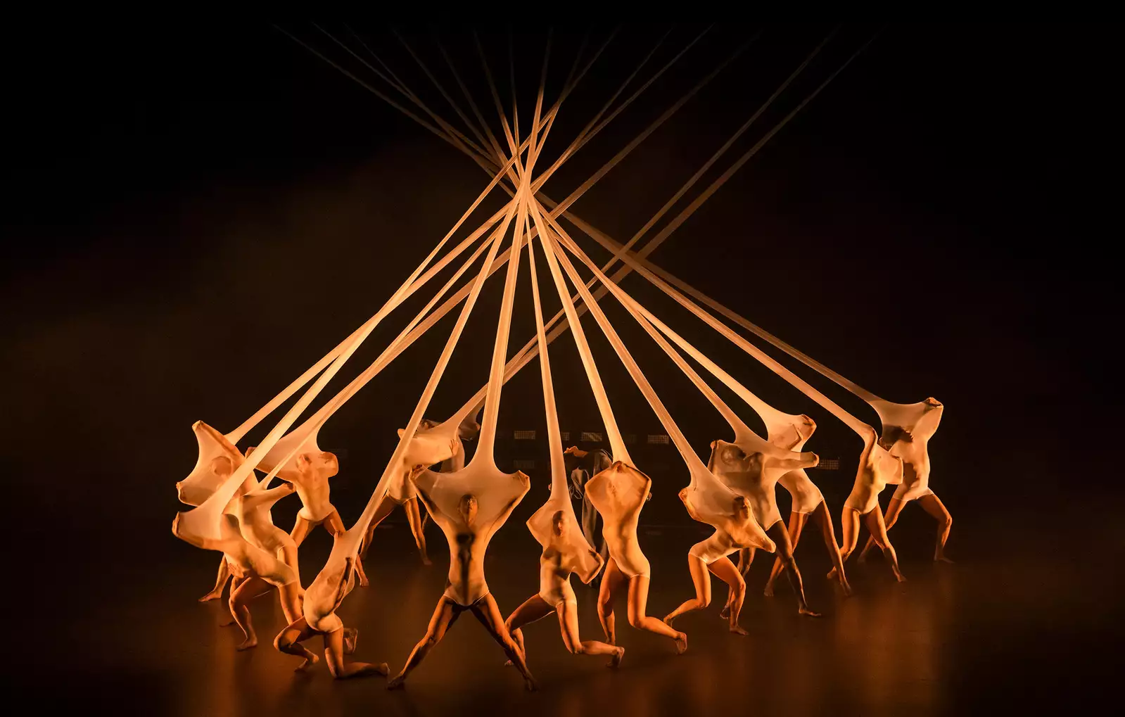 Photo of the loom dancers on stage in Free Your Mind