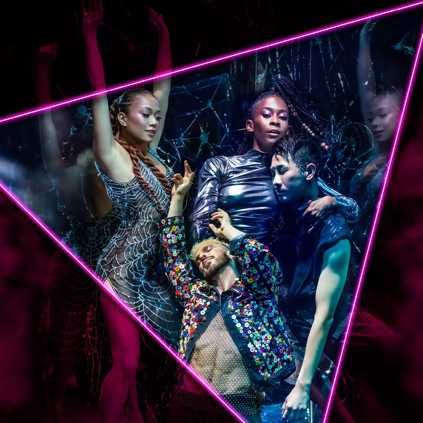 Neon-lit dancers posing inside a glowing triangle frame at a nightclub.