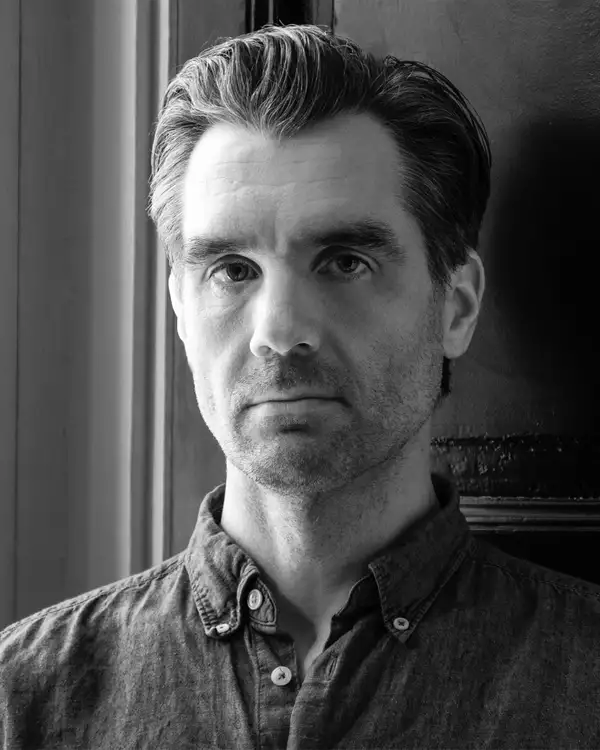 Black and white headshot of Will Duke