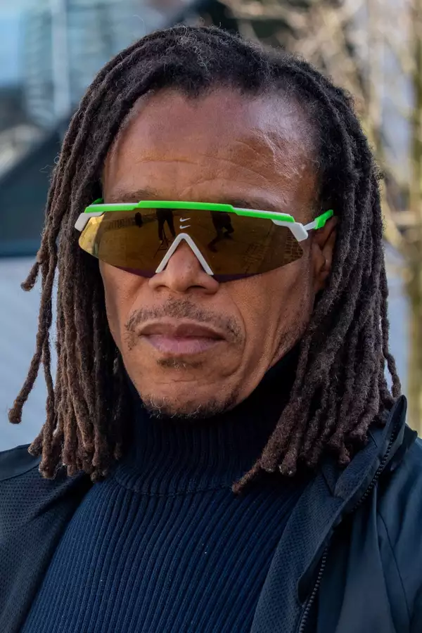 Edgar Davids stood outside wearing sunglasses