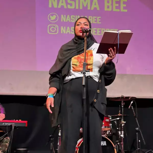 Photo of Nasima Begum on stage