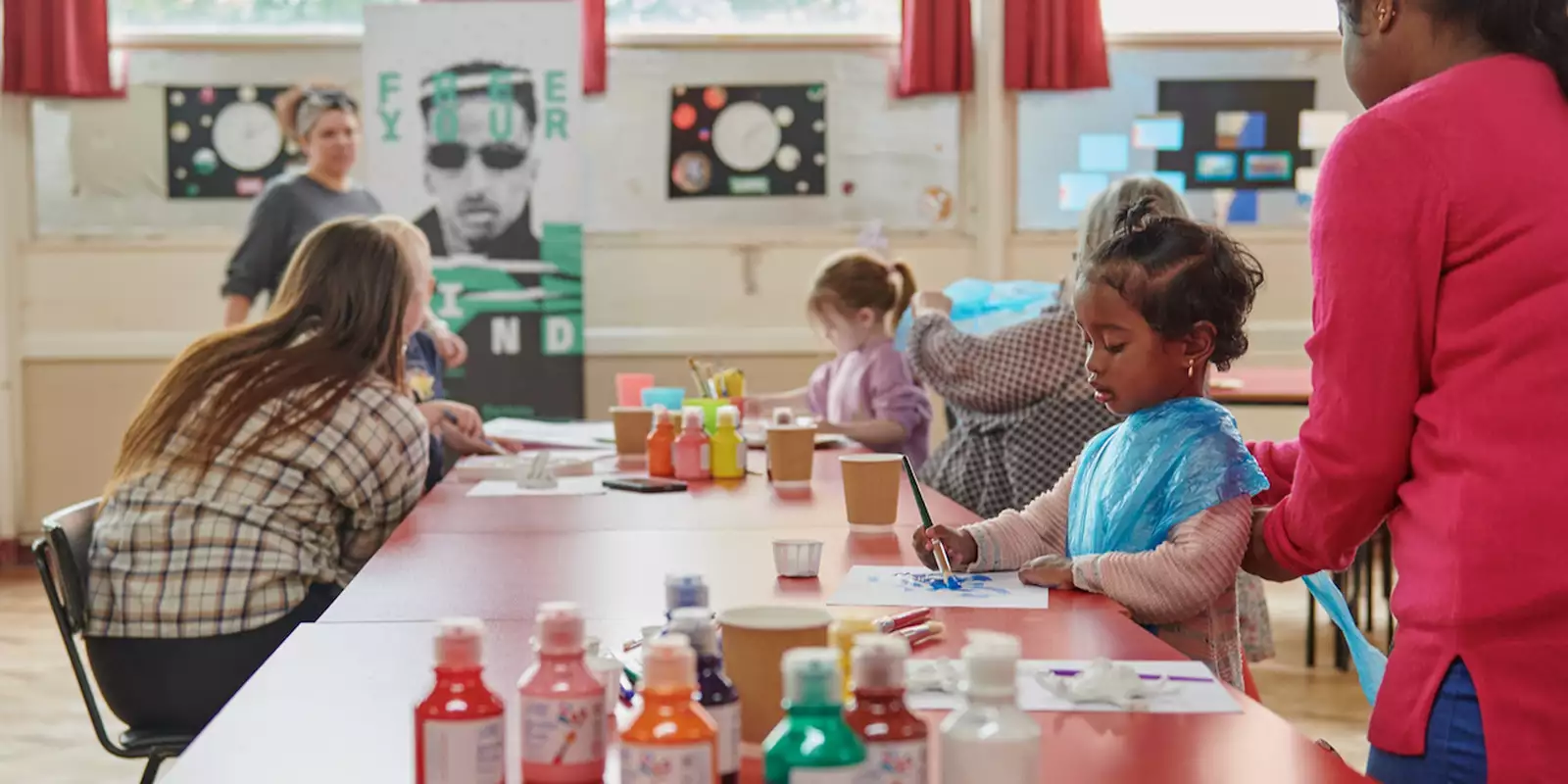 Photo of families painting together