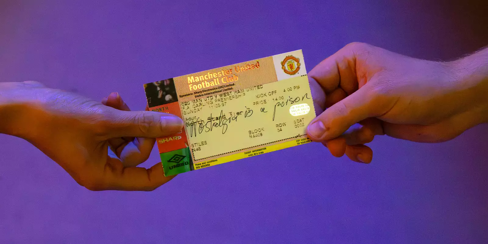 Someone holding a ticket as part of Football City Art United