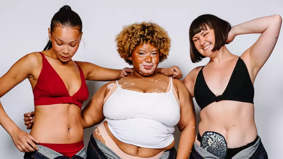 Three models modelling jeans and crop tops