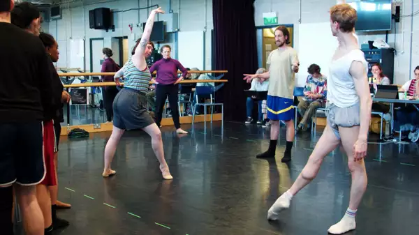 A busy rehearsal room for A Single Man, with dancers being directed by Jonathan Watkins