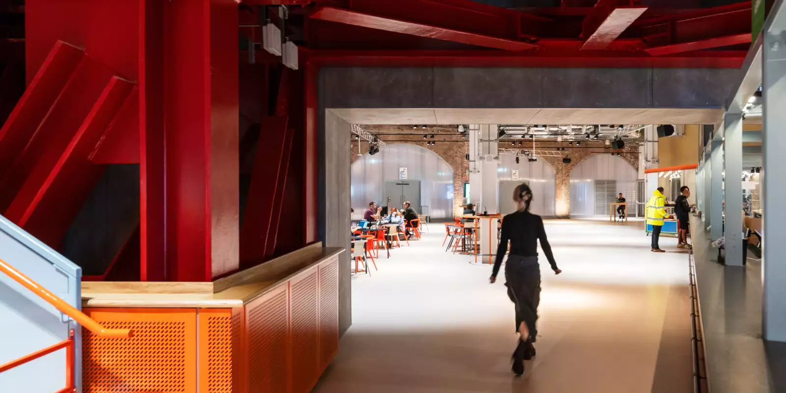 Interior of Aviva Studios with a visitor walking through