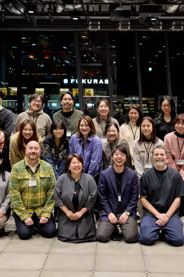 A large group photo of a producer training course