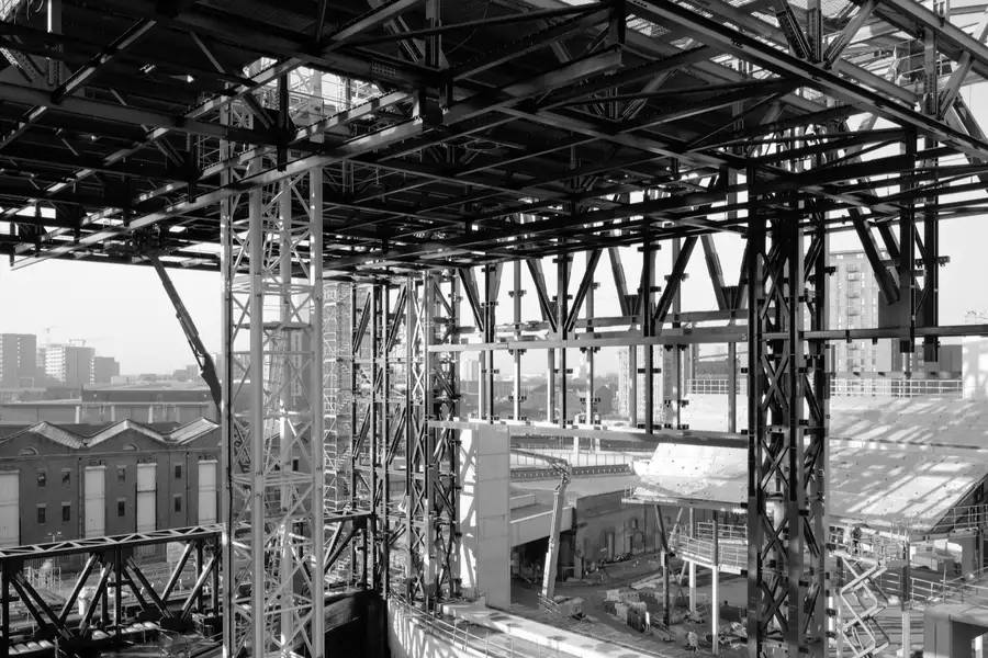 Black and white photograph by Hélène Binet showing the construction of Aviva Studios