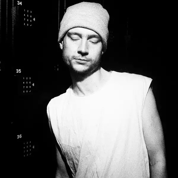 Black and white headshot of loney DJ