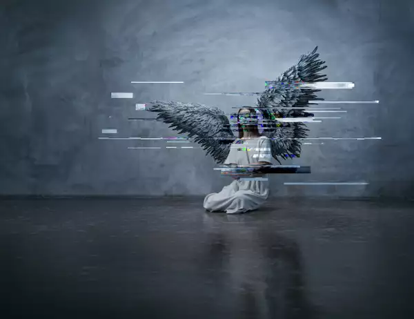 An angel cowers in a corner with glitchy effect