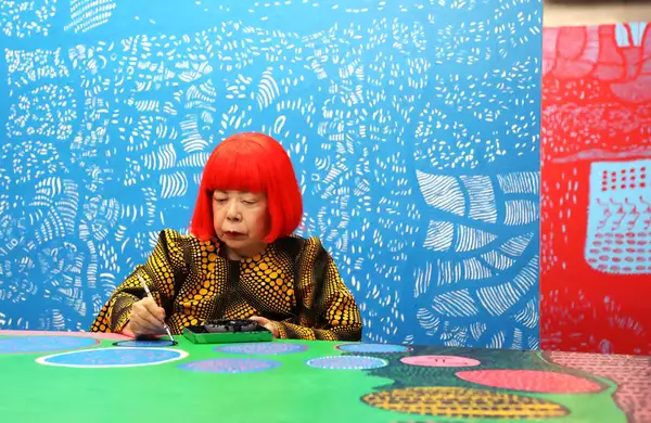 Yayoi Kusama in her studio