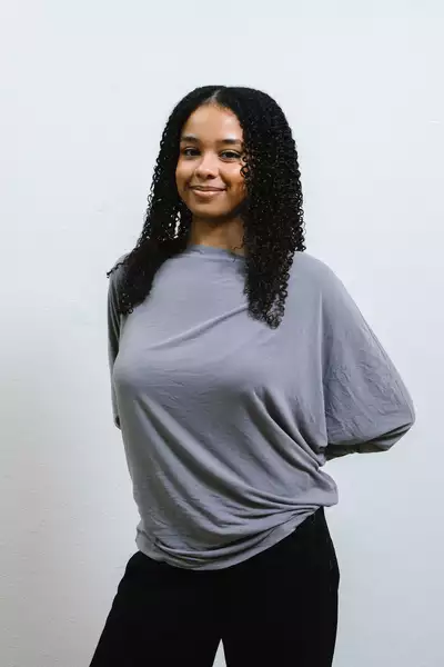 Rayyanah Munye wearing a grey top