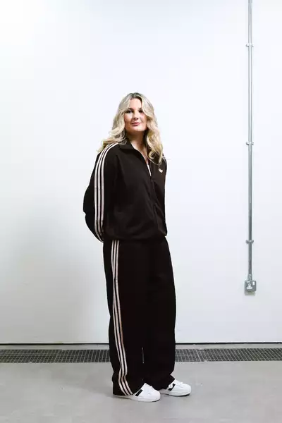 Phoebe Bonser wearing a black Adidas tracksuit