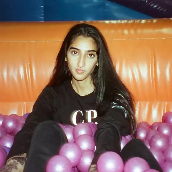 Photo of Alina Akbar in a pink ball pool