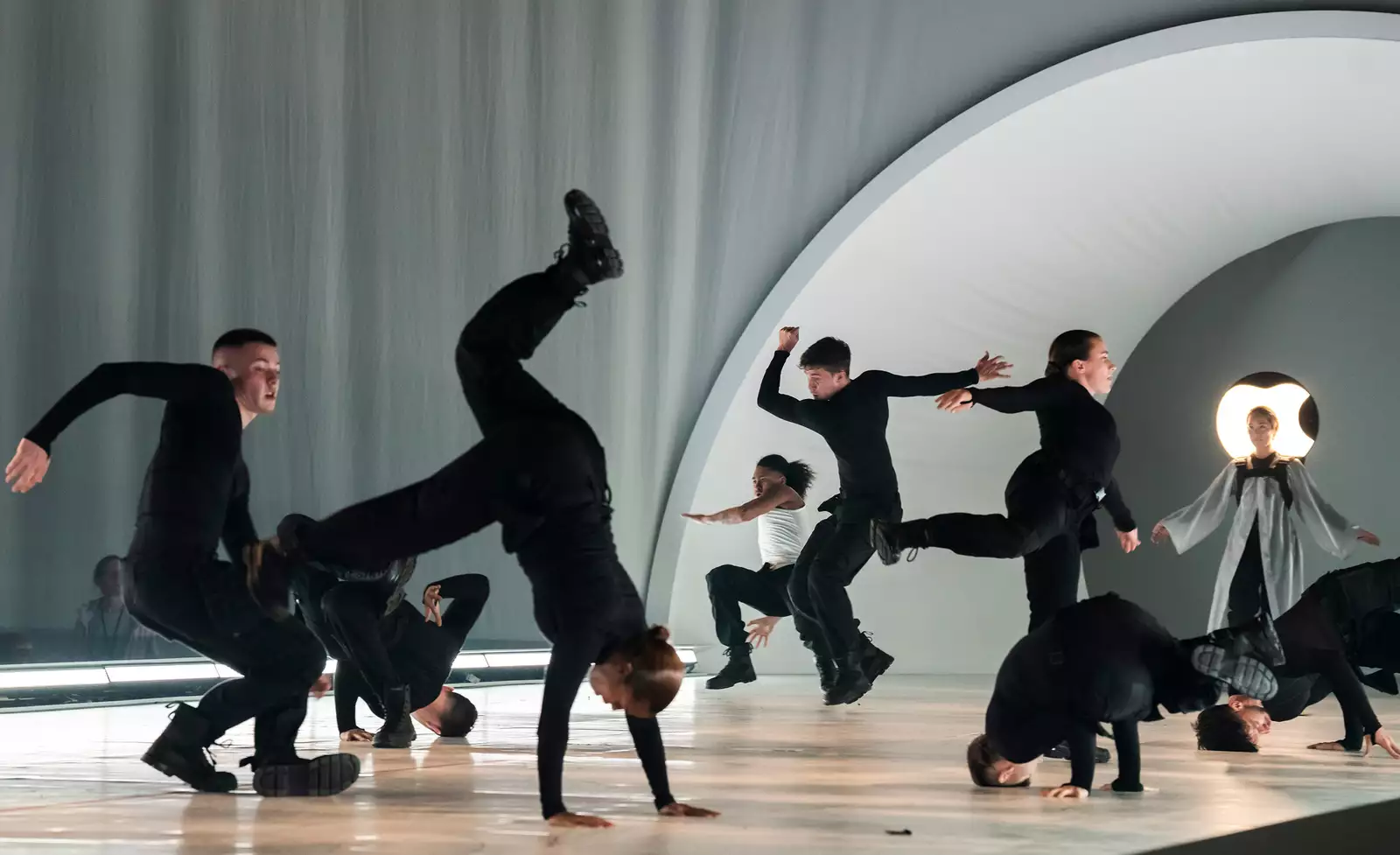 Dancers performing headstands on stage for Free Your Mind