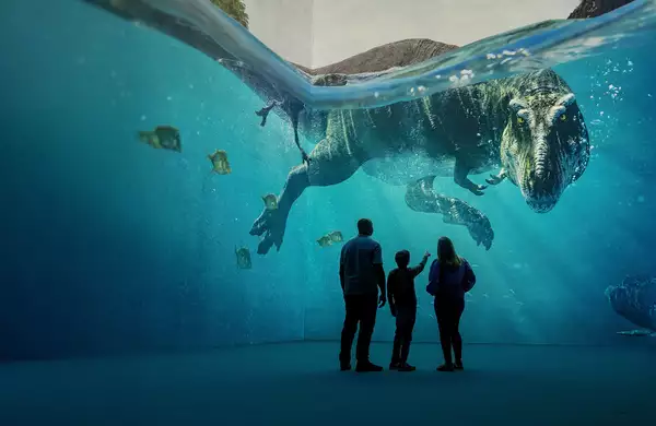 Three people looking at a giant dinosaur swimming in Lightroom
