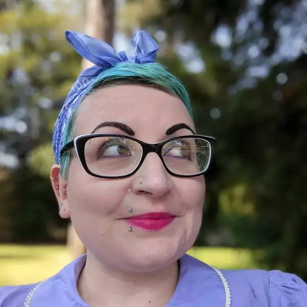 Headshot of Gemma Lees wearing a purple top