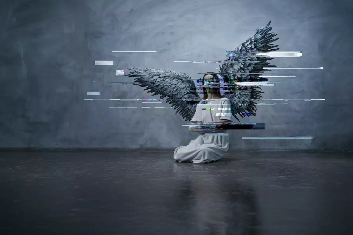 An angel cowers in a corner with glitchy effect