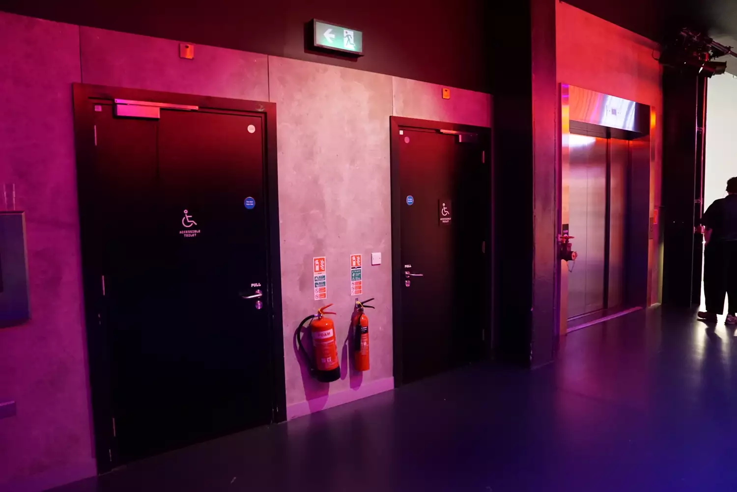 Doors to the two toilets next to the Warehouse