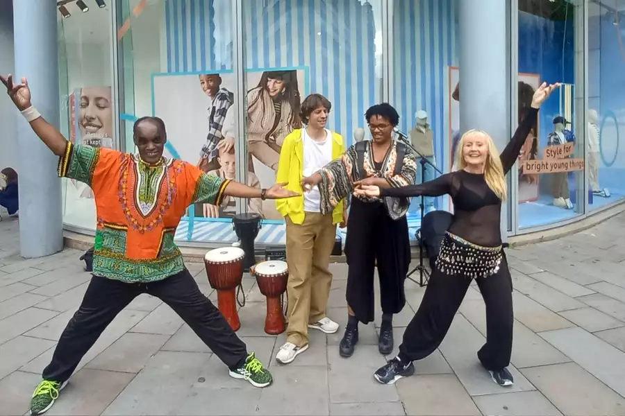 Group shot of members of the dance out percussion team