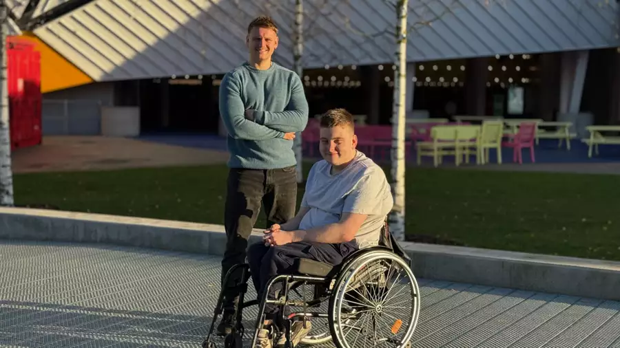 Beck and Jimmy Royals outside Aviva Studios on a sunny day