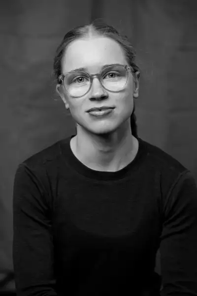 Black and white headshot of Rose Symons