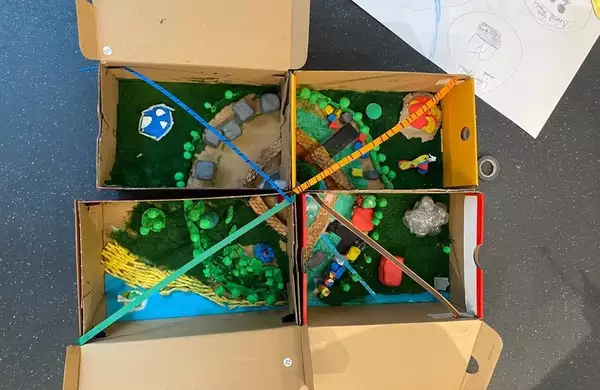 Four decorated shoeboxes