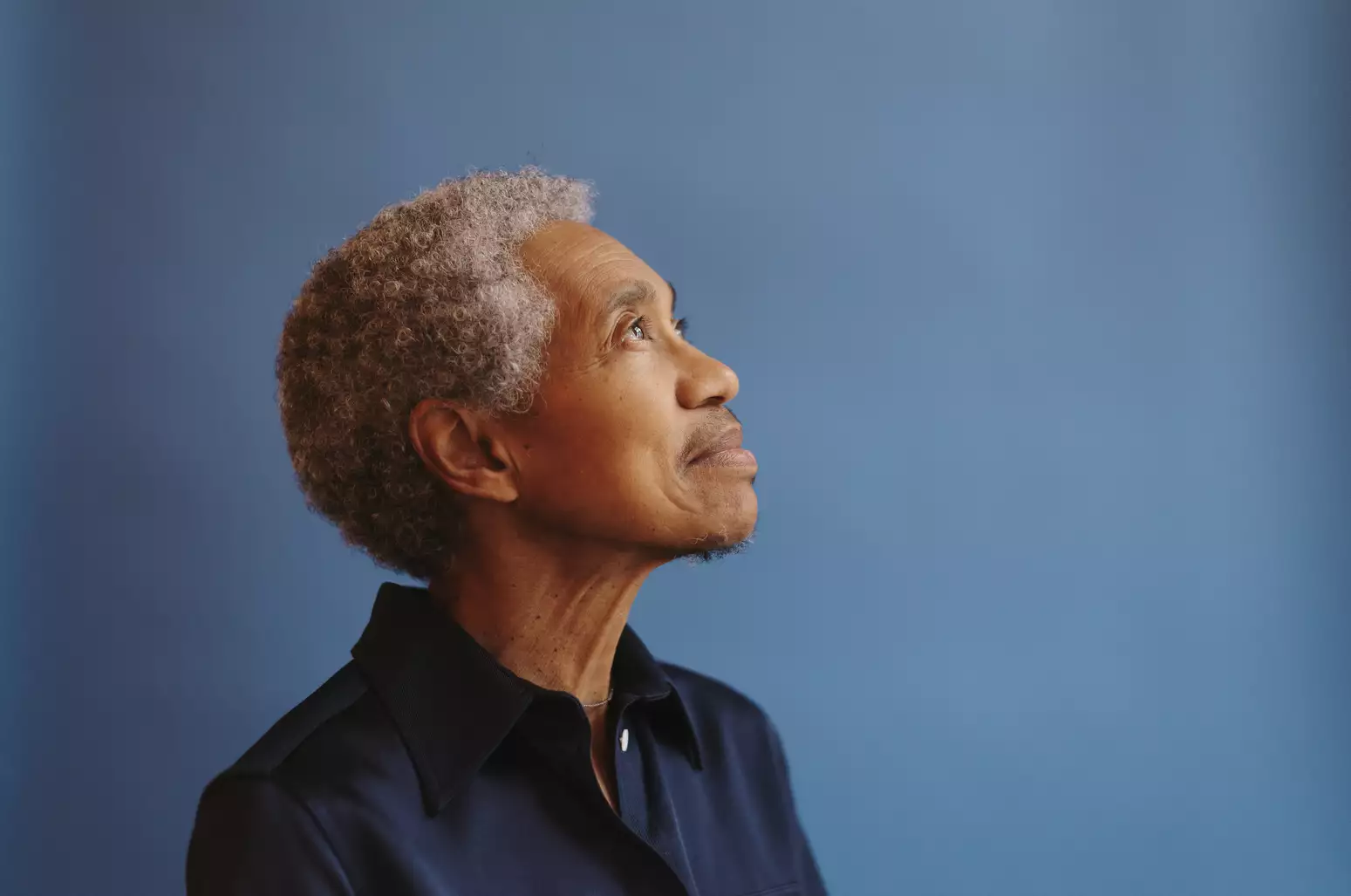 Singer Beverly Glenn-Copeland against a blue background