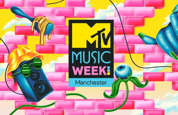 An MTV Music Week promotional poster for Manchester. The design features a surreal and colorful illustration. Pink bricks are scattered in front of a bright yellow background with clouds. Key elements include a dripping honey spoon, a blue hand with green fingernails, a speaker with sunglasses and a yellow hat, and an eyeball attached to green vines. The MTV Music Week logo appears in the center in bold black with 'MUSIC WEEK: Manchester' written below it in blue and pink