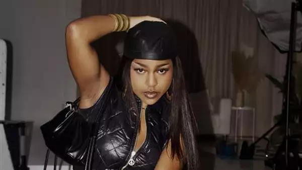 Photo of Amatiime wearing all black