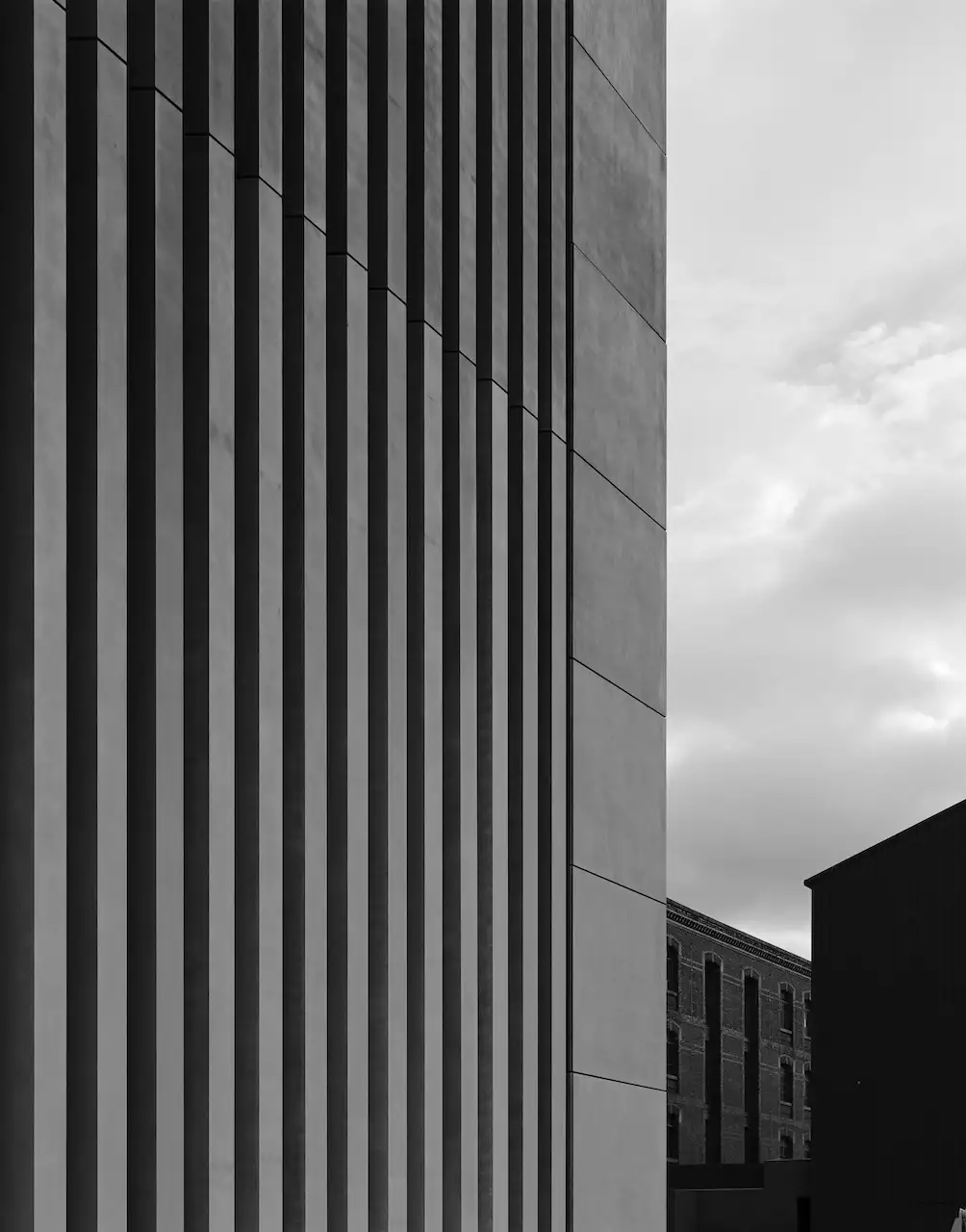 black and white photographs of a concrete wall during the Aviva Studios build