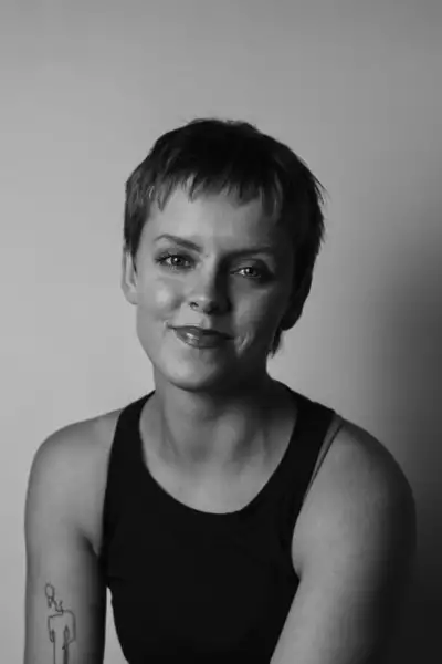 Black and white headshot of Anais Stewart