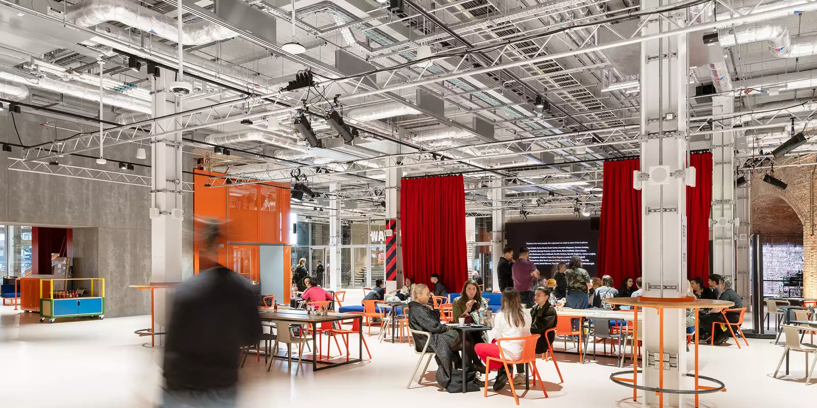 Photo of visitors sat down in the Social