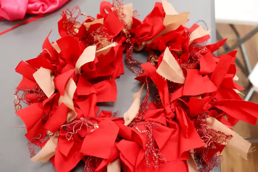 A red fabric wreath by Stitched Up