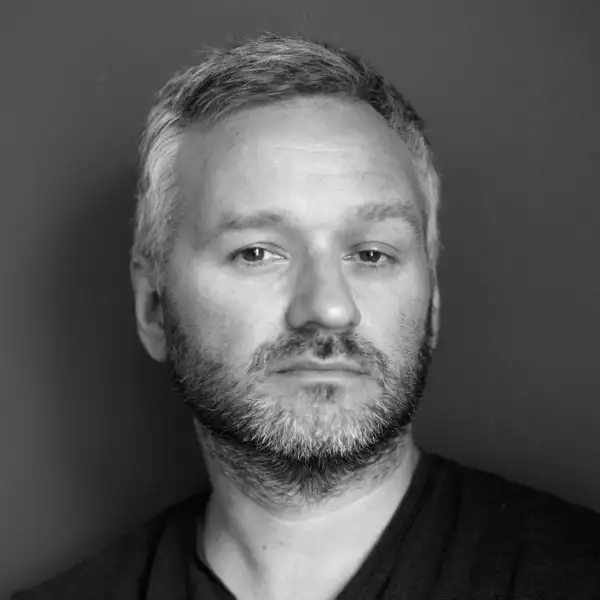 Black and white headshot of Mishka Henner