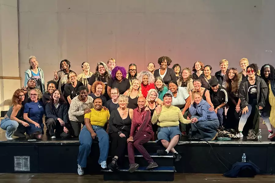 Group photo of Nia Choir on a stage