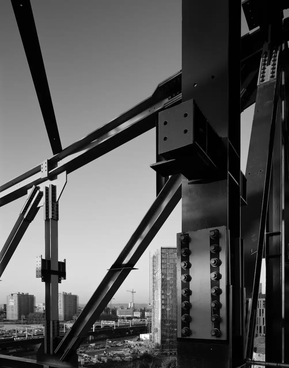 Black and white photograph of the Aviva Studios theatre roof truss being built