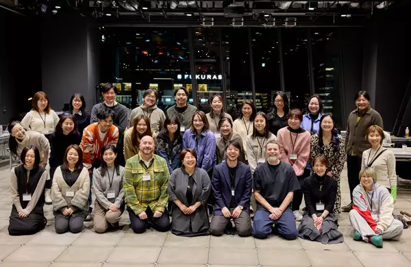 A large group photo of a producer training course