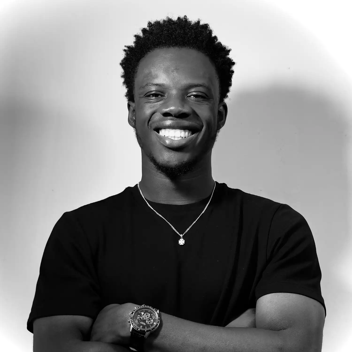 Black and white headshot of David Ajibola