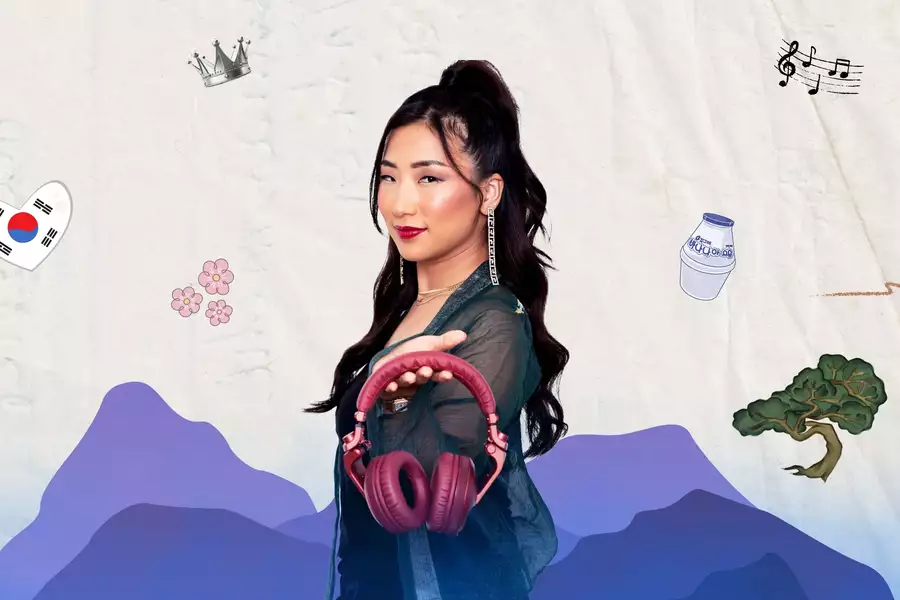 Always K-pop promotional image - DJ Emkay holds out a pair of headphones