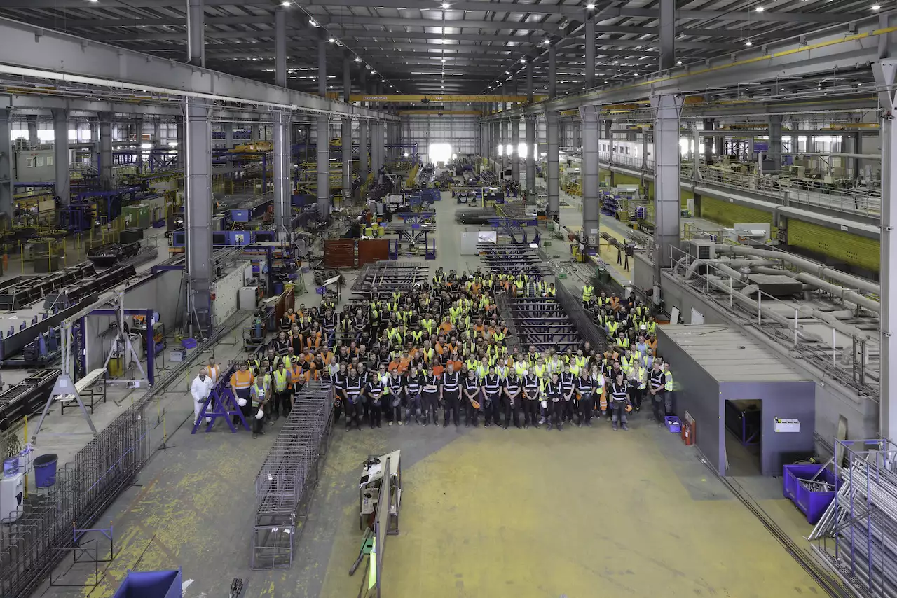 Group photograph of workers from Explore Manufacturing